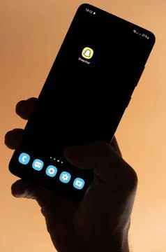Open Snapchat  app on smartphone Stock Photos