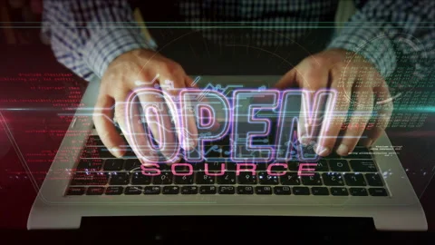 Open source code with man typing on a computer keyboard Video stock 148324019