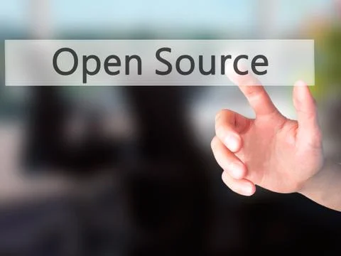 Open Source - Hand pressing a button on blurred background concept on visual  Stock Photos