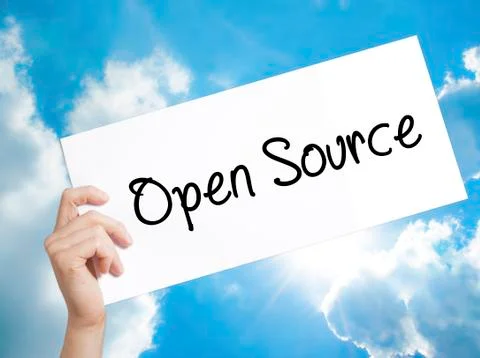 Open Source Sign on white paper. Man Hand Holding Paper with text. Isolated.. Stock Photos