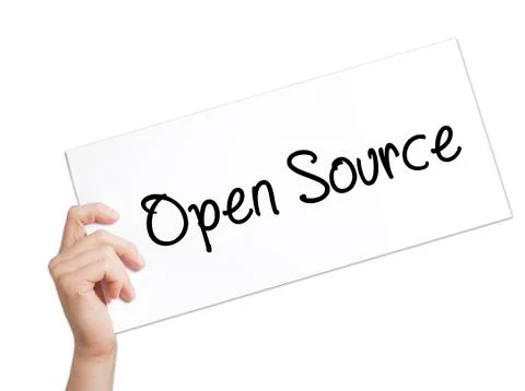 Open Source Sign on white paper. Man Hand Holding Paper with text. Isolated o Stock Photos