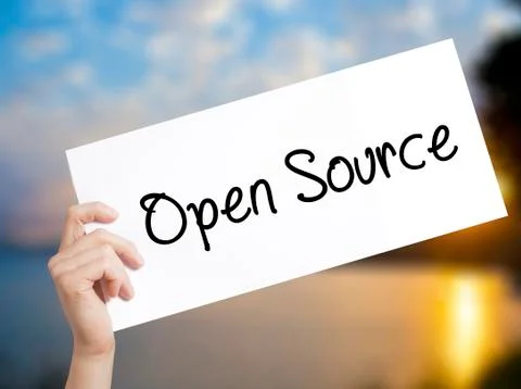 Open Source Sign on white paper. Man Hand Holding Paper with text. Isolated o 스톡 사진