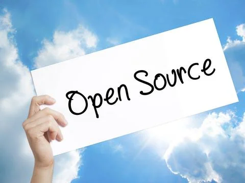 Open Source Sign on white paper. Man Hand Holding Paper with text. Isolate... Stock Photos