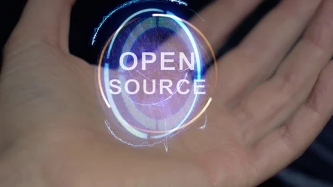 Open source text hologram on a female hand 動画素材 115640329