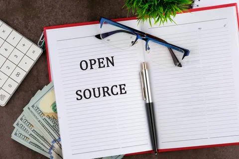 OPEN SOURCE words It is written in a business book in a composition with a ca Stock Photos