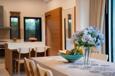 Open space dining area and kitchen Stock Photos
