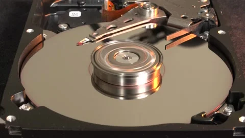 Open spinning hard drive with flashing light effects on the surface - C0023 Stock-Footage 320835865