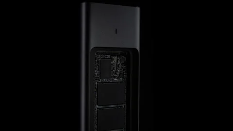 Open SSD Case with inside High-Speed M.2 on black background, External USB Drive Stock Footage 270469354
