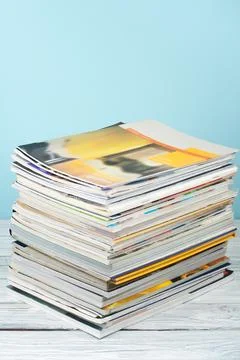 Open stacking book, magazine hardback colorful books on wooden table and bl.. Stock Photos