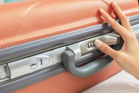 Open suitcase with security code Stock Photos