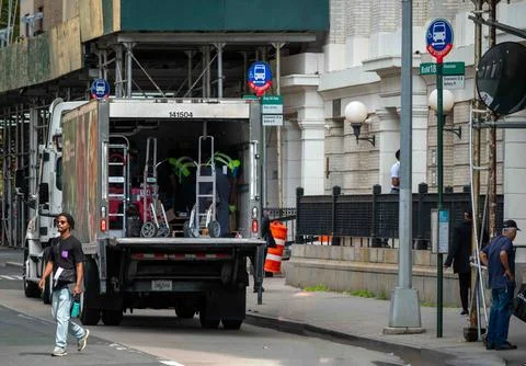 Open Sysco truck full of construction equipment NYC Stock Photos