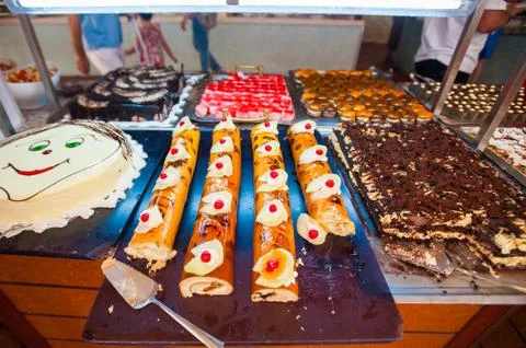Open table with cakes. Outdoor table for visitors Stock Photos