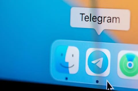 Open Telegram app in macbook dock Stock Photos