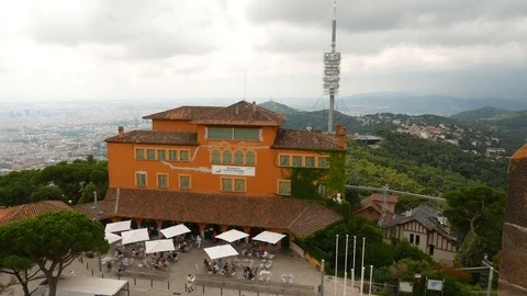 Open terrace and restaurant building with ivy, Barcelona, Spain Stock Footage 99644354