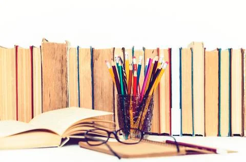 Open textbook, notebook, stack of books education back to school background,  스톡 사진
