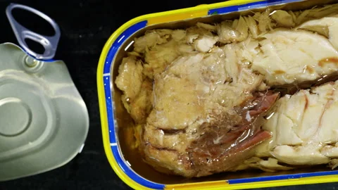 Open tin can of mackerel fillets in oil. Stock Footage 237865917