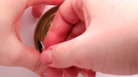Open tin can with red caviar on a white background. Video stock 237226649