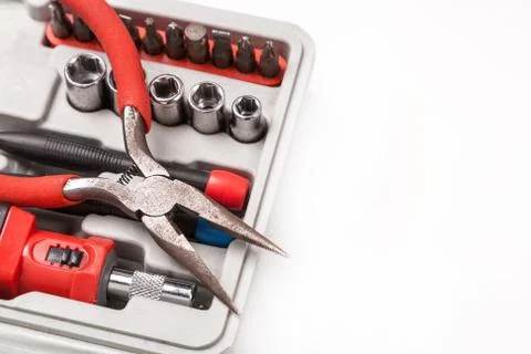 Open toolbox with screwdriver, heads and bit Stock Photos