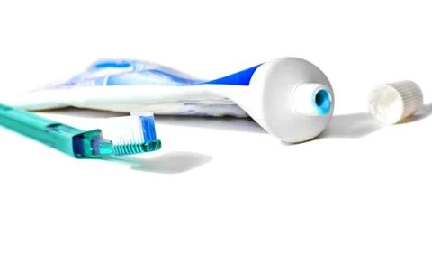 Open Toothpaste And A Toothbrush Stock Photos