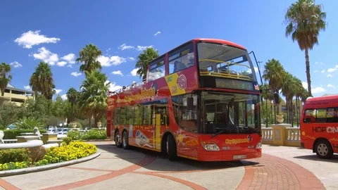 Open top bus stopped at Ceasars Palace Stock Footage 103553281