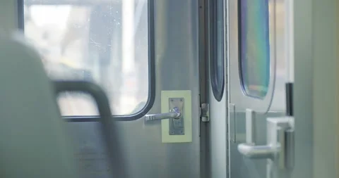 Open Train Doors Provide Glimpse of Empty Station Platform 스톡 동영상 323683471