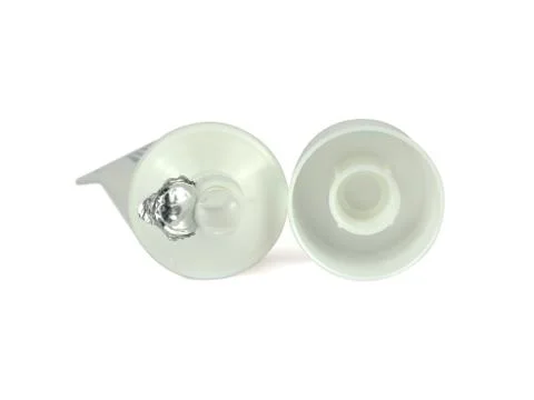 Open Tube of Paste on White Stock Photos