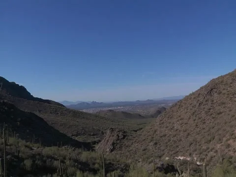 Open Valley with City in Desert Stock Footage 50438601