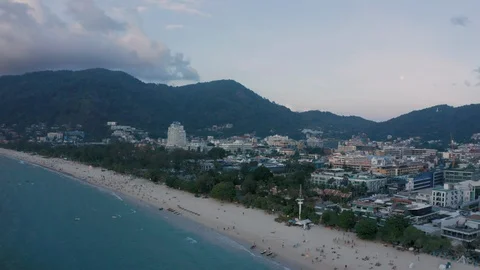 Open view of Patong  beach with numerous tourists and hotel buildings in Stock Footage 128176887
