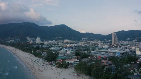 Open view of Patong  beach with numerous tourists and hotel buildings in Stock Footage 128176974