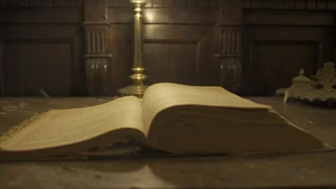 Open vintage book on the table Video stock 272604454