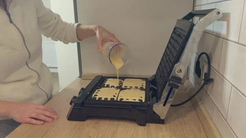 Open Waffle Maker Filling Batter Cooking Fresh Waffles Breakfast Scene 库存影片 344249693
