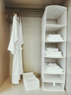 Open wardrobe with clothes Stock Photos