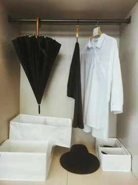 Open wardrobe with clothes Stock Photos