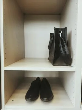 Open wardrobe with clothes Stock Photos