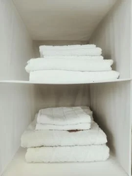 Open wardrobe with clothes Stock Photos