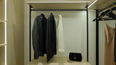 Open wardrobe with clothing (2) Vidéo 321295911