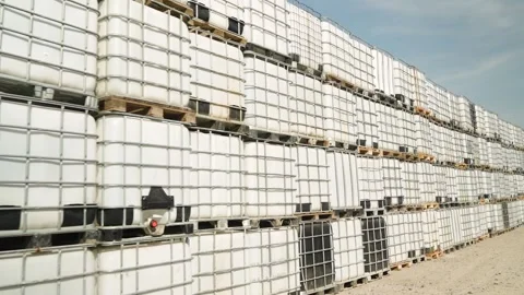 Open warehouse Industrial Cube Barrels. Panorama Stock Footage 253336327