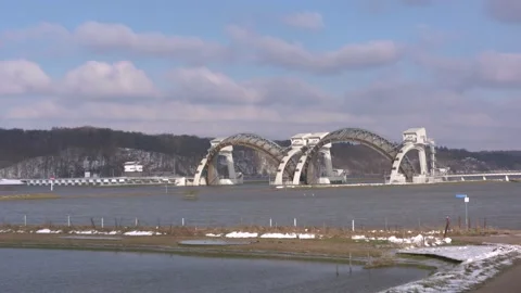 Open weir, flood gates raised, high water level river Rhine Video stock 148465548