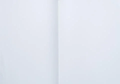 Open White Book Spread with Center Spine Minimal Background 写真素材