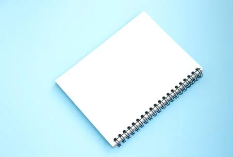 Open white notebook on mint background. Back to school Foto stock