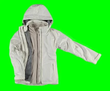 Open white warm jacket. Isolated white jacket on a green background. Stock Photos