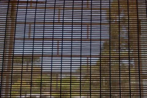 Open window and in front a rustic wooden shutter Stock Photos