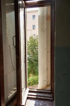 An open window and a view from the window of an old Petersburg house Stock Photos