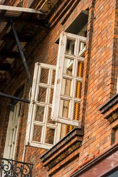 Open window in brick building architecture concept Stock Photos