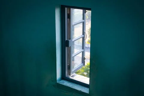 An open window in a building wall. Stock Photos