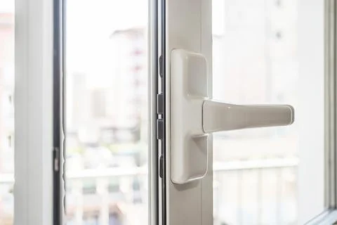 Open Window Handle with Natural Light in Modern Apartment Photos