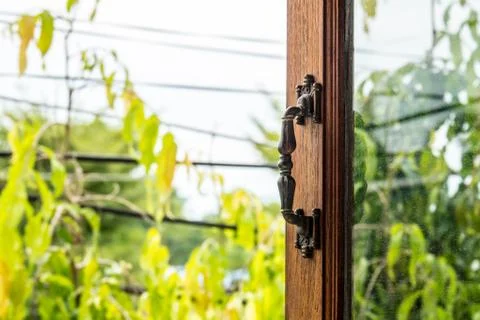 Open the window handle to the outside Stock Photos