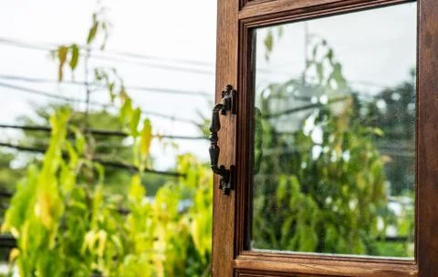 Open the window handle to the outside Stock Photos