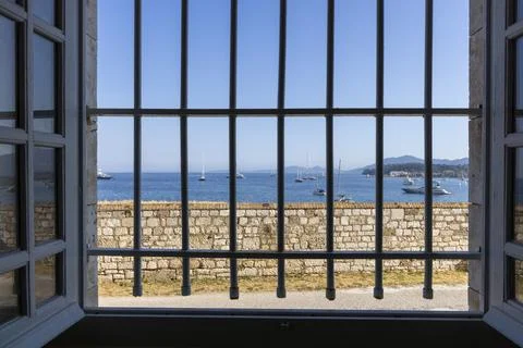 Open window looking out at Corfu island seascape Stock Photos
