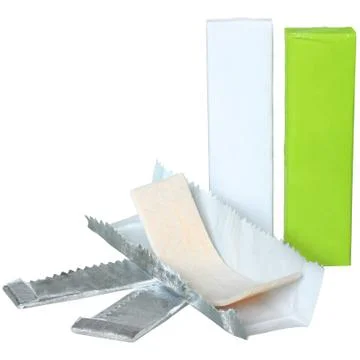 Open wrapper with gum inside Stock Photos